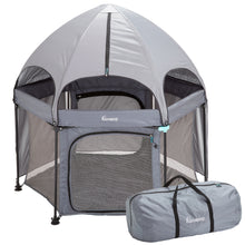 Load image into Gallery viewer, Gray hexagonal playard fully set up with its dome canopy attached, isolated on a white background next to its carry bag.
