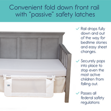Load image into Gallery viewer, Grey crib showing the white bed rail folded completely down for easy access and sheet changes, featuring passive safety latches. Passes all federal regulations.